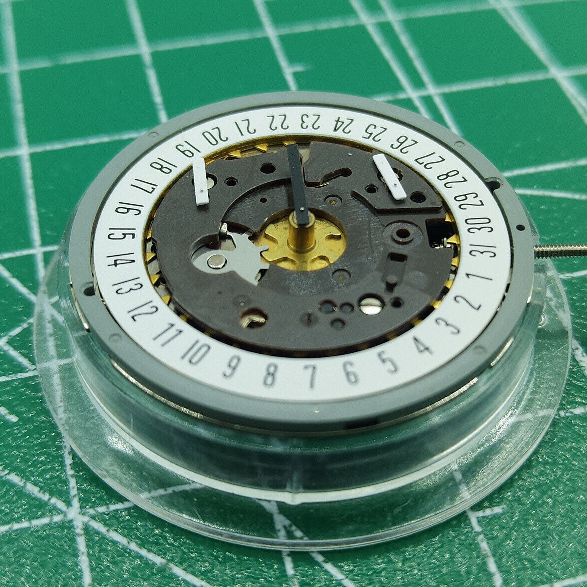Swiss ISA 8162 quartz watch movement with date at 6, ideal replacement for precise timekeeping accessories.
