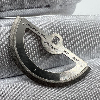 Silver rotor oscillating weight for 8N24 movement, generic fit watch part enhancing automatic winding.