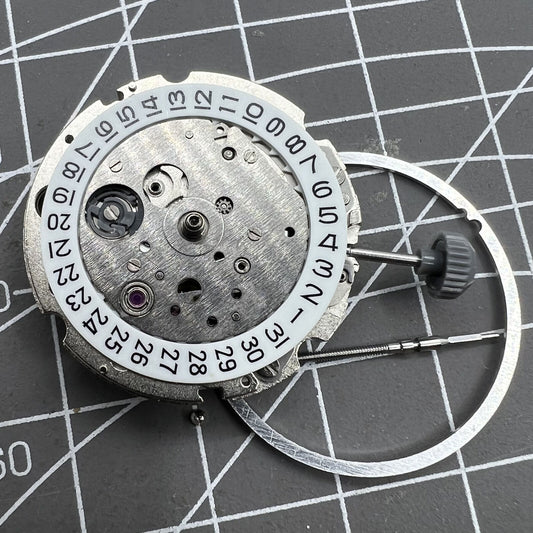 Miyota 821A quartz watch movement by Citizen, reliable Japanese mechanism for precise timekeeping.