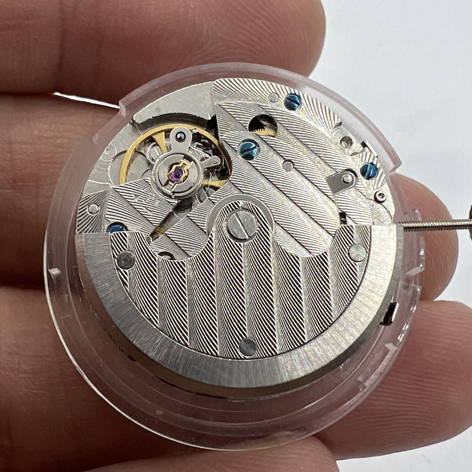 Seagull ST16 watch movement displaying small second subdials at 3, 6, and 9 o'clock positions for precise timekeeping.