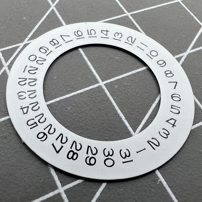 Thickening white date wheel overlay for ETA2824 movement with date window at 3 o'clock.