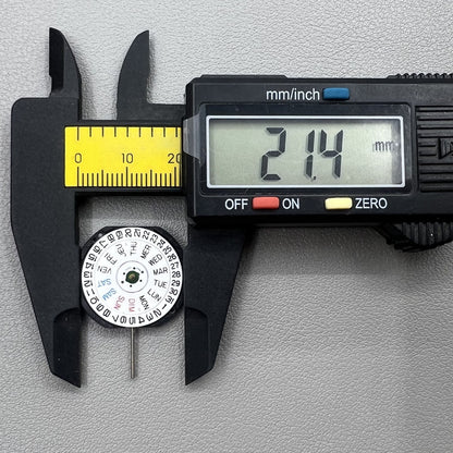 Japan Epson V733C quartz watch movement showing day and date display for accurate timekeeping.