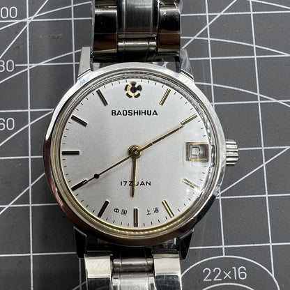 33mm Shanghai manual mechanical watch with single calendar, 17 jewels, shock-resistant design.