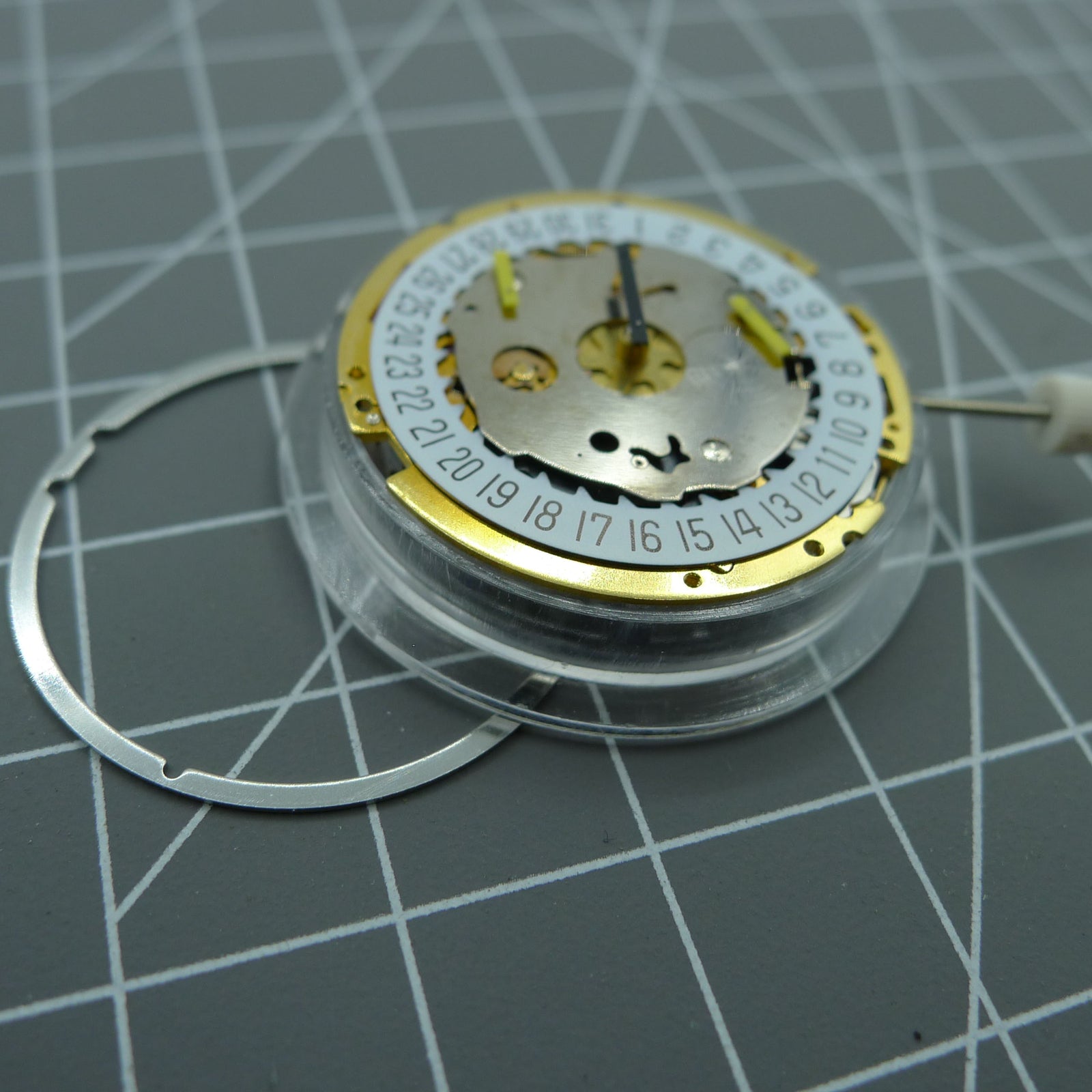 Swiss Made ISA 8171 watch accessory, quartz movement with date at 6 and multifunctional dial.