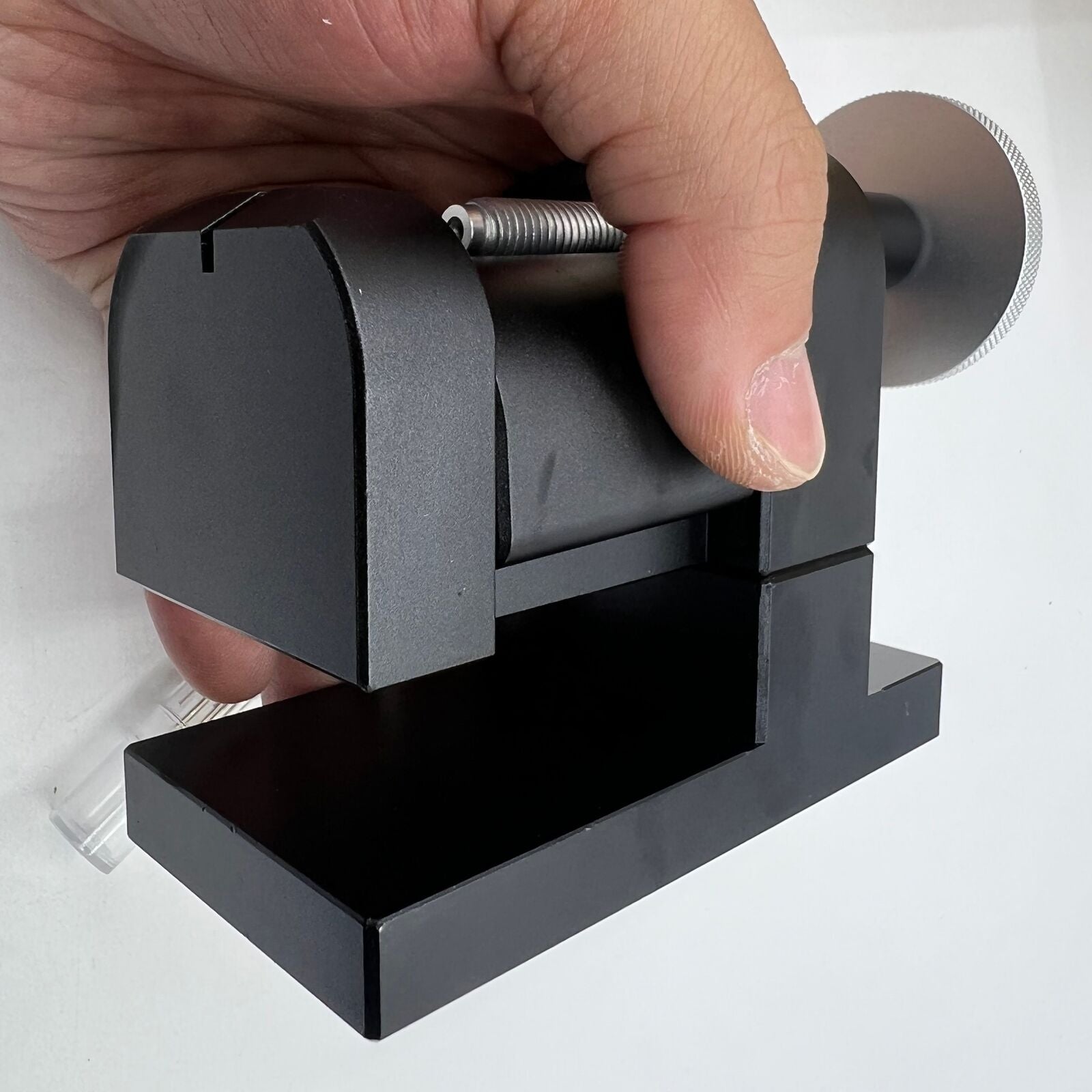 Adjustable watch strap link pin remover tool for precise bracelet chain repairs.