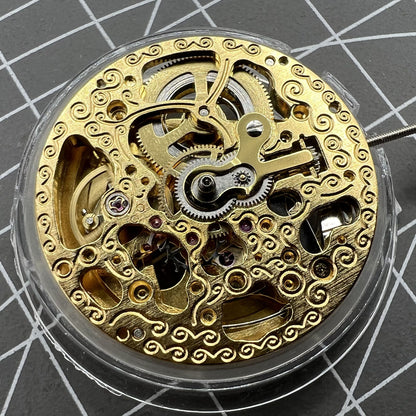 Hangzhou 2189 automatic watch movement with golden 3-hand skeleton design for precise timekeeping.