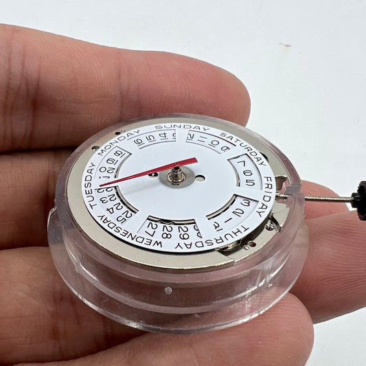 ST2147 automatic mechanical watch showing day at 12 o'clock and date at 3 o'clock, precise timekeeping.