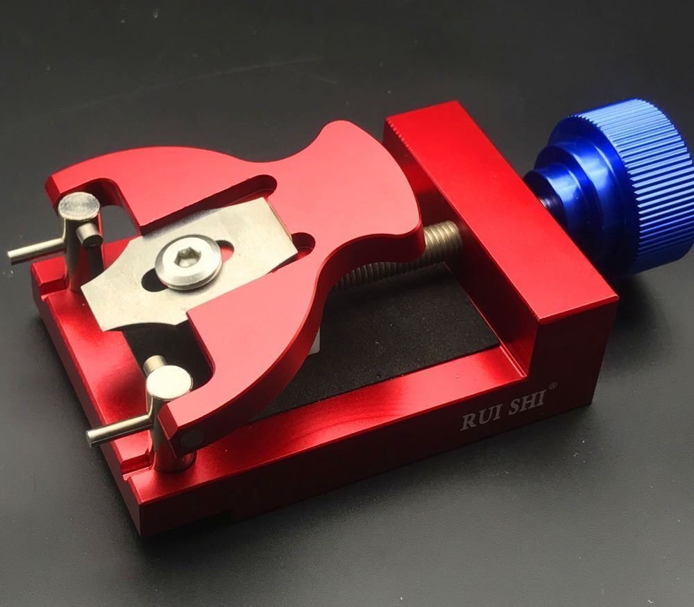 Durable watch case back opener for precise bezel ring removal in watch repair.