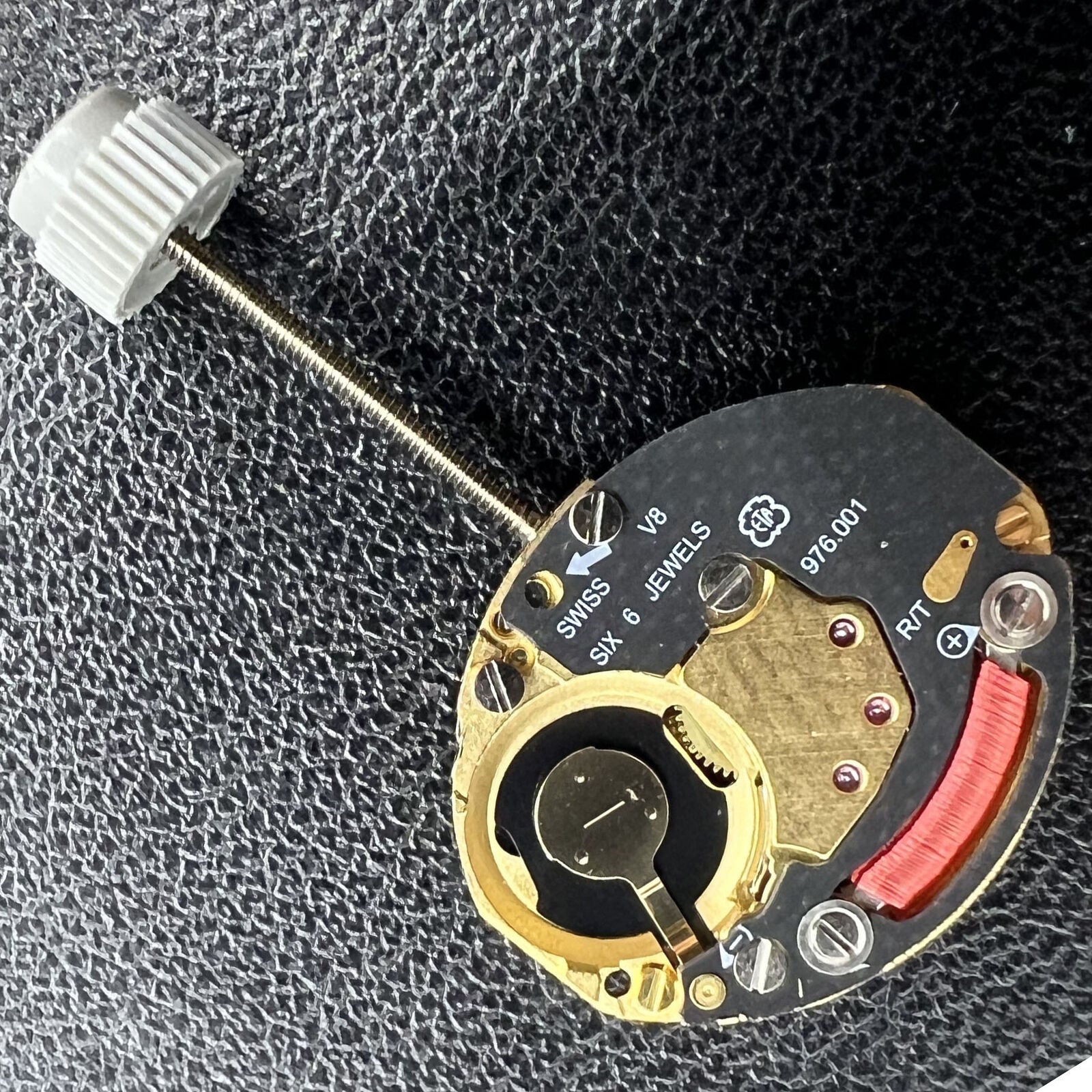 ETA 976.001 quartz watch movement with 2 hands, precise timekeeping component by ETA for watch repairs.