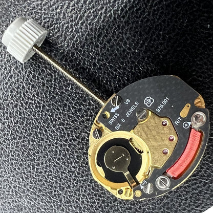 ETA 976.001 quartz watch movement with 2 hands, precise timekeeping component by ETA for watch repairs.
