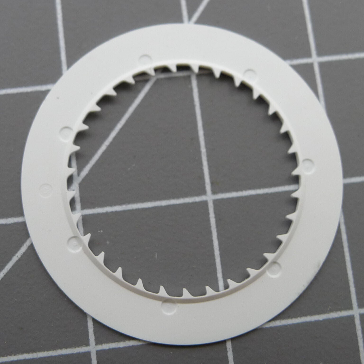 Blue font date disk wheel for Seiko NH35 watch movement on black background.