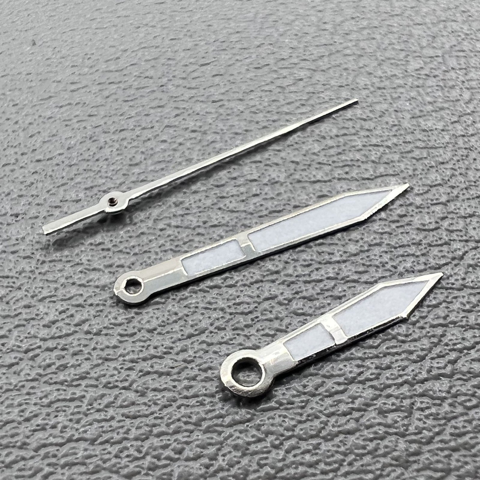 Set of green luminescent watch hands with silver trim, 10x14x14mm, for Ronda 515.