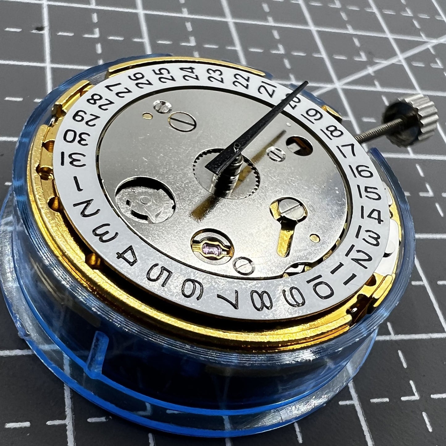 Polished gold Tianjin T16 mechanical watch movement, compatible with Miyota 8200, precision replacement part.