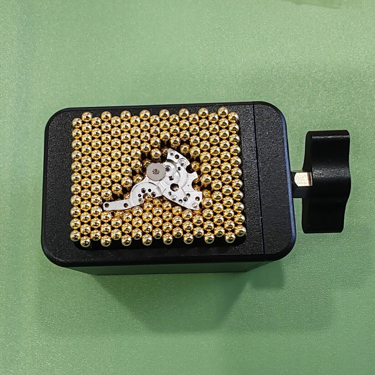 Universal metal watch movement holder with beads, secure repair tool compatible with all watch shapes - Brand Generic.