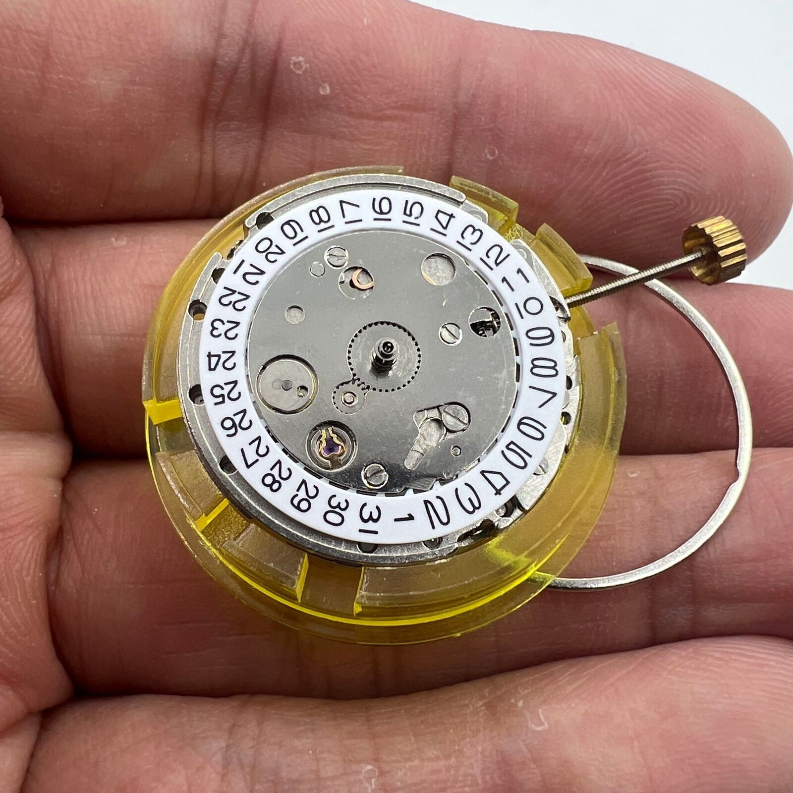 DG2813 automatic mechanical watch movement with 3 hands and date feature for replacement parts.