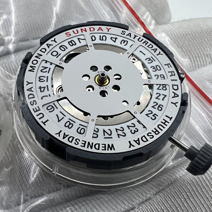 Close-up of Japan Made Miyota 8285 automatic mechanical watch movement showcasing precision engineering.