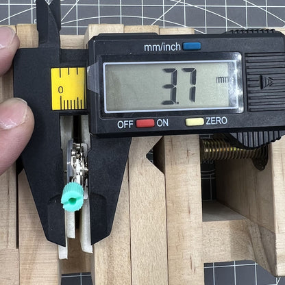 NH06A watch movement with double calendar date display at 3 o'clock, Japan-made precision mechanism by Seiko.