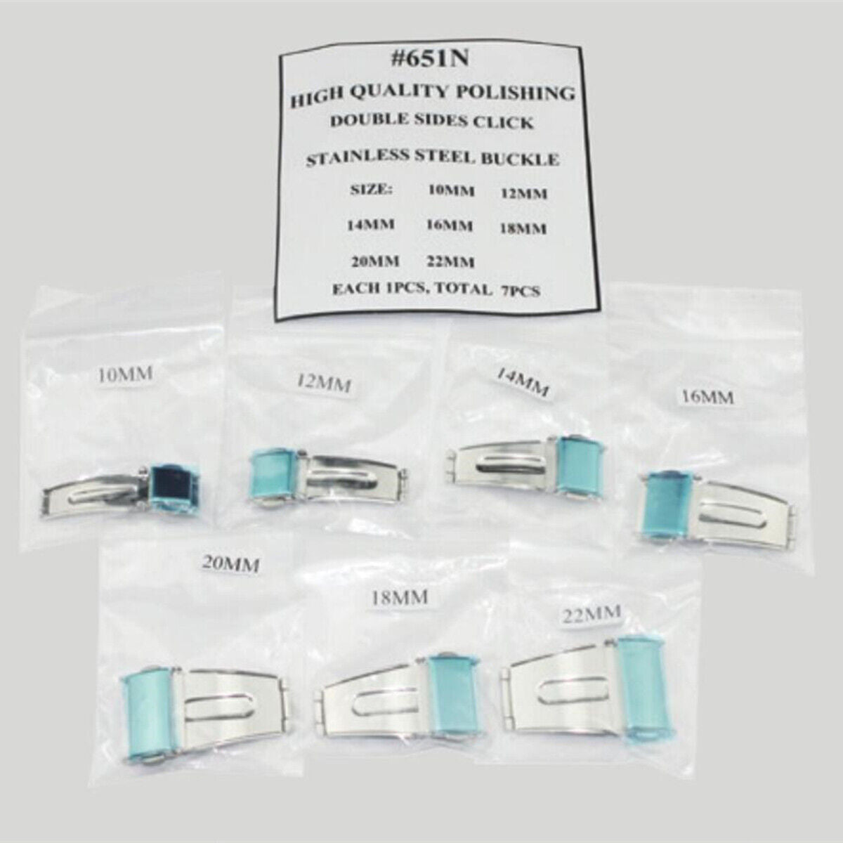 Set of 7 silver double-sided stainless steel watch buckles, polished for a sleek finish.