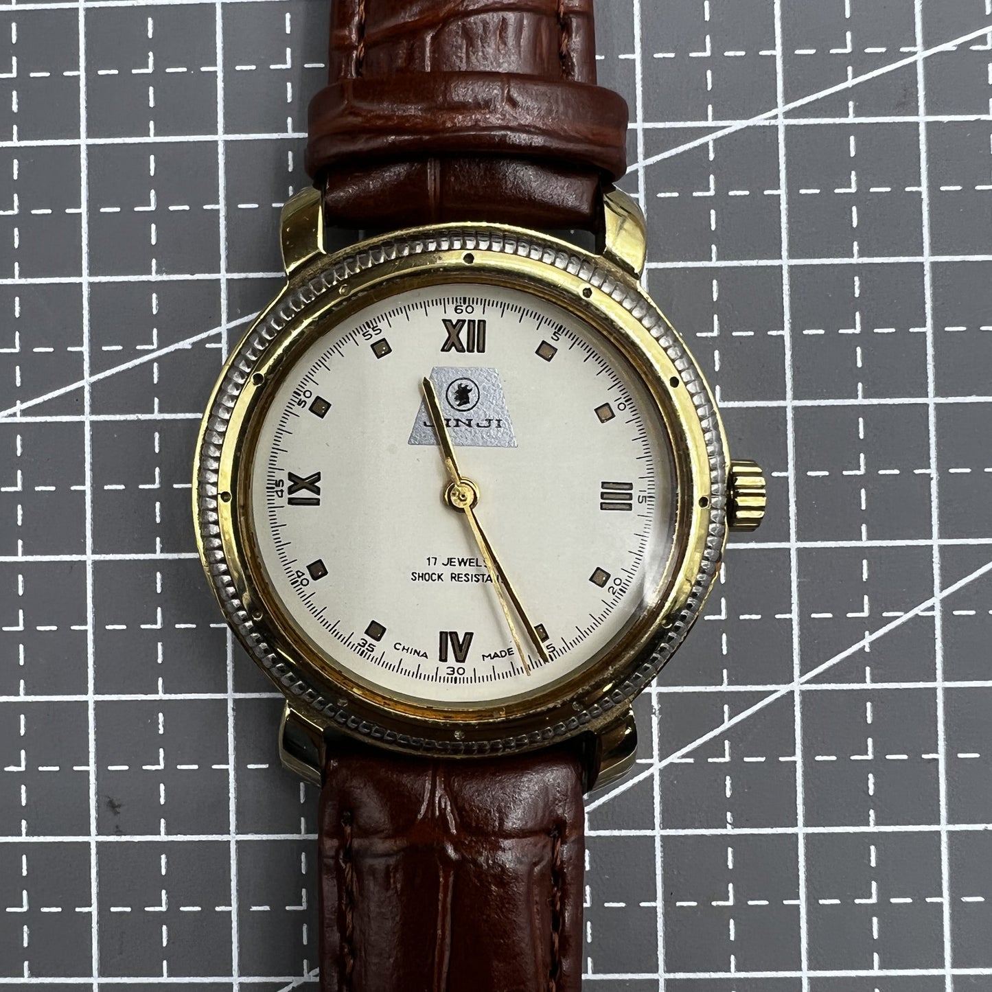 SHANGHAI JINJI Manuelle mechanische Uhr, römische Ziffern, 17 Juden, stoßfest