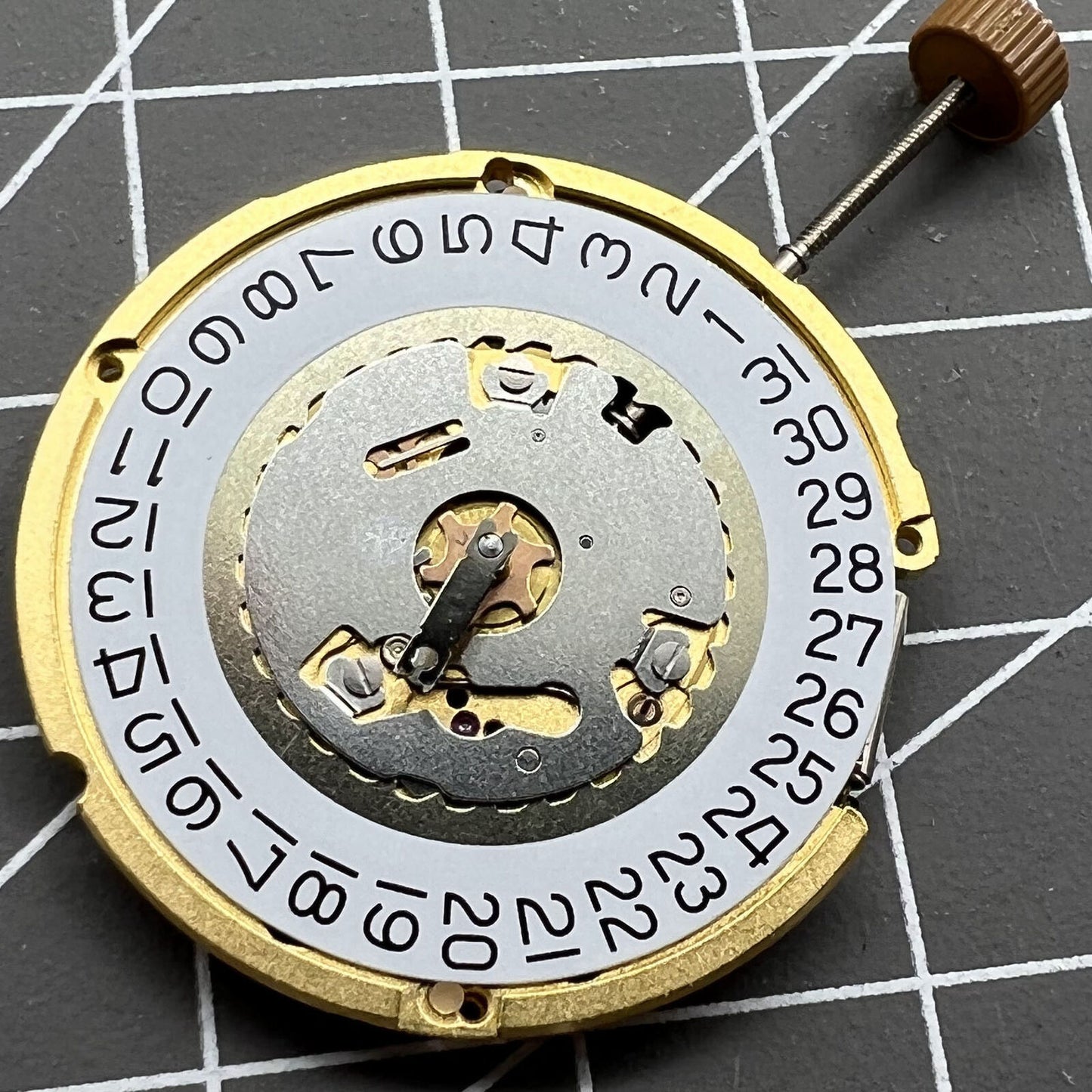 Swiss Made Ronda 6004D quartz watch movement with date at 3 o?clock, precision timing by Ronda.