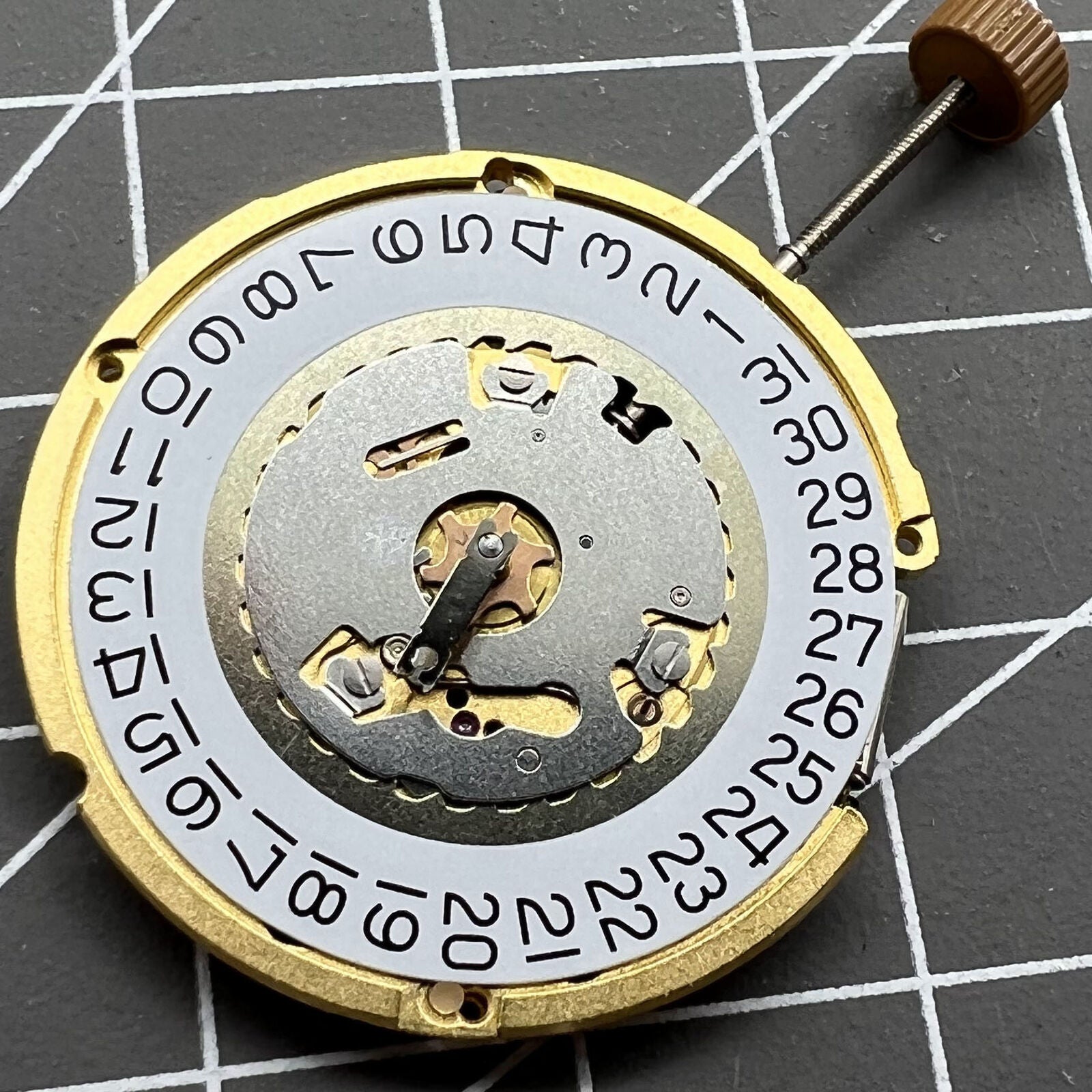 Swiss Made Ronda 6004D quartz watch movement with date at 3 o?clock, precision timing by Ronda.