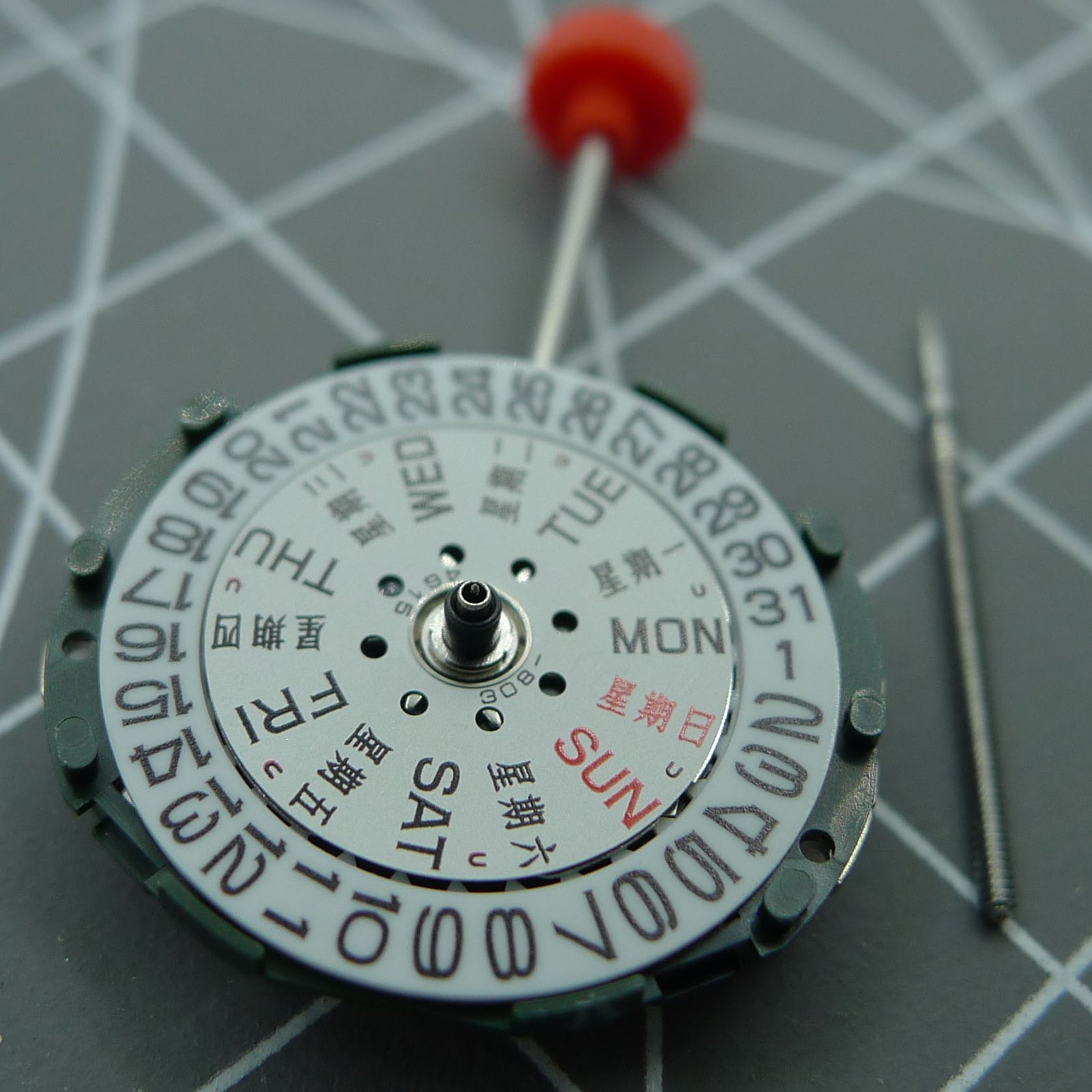 Japan-made Miyota/Citizen 2005 quartz movement with day-date function and stem for precise watch repair.