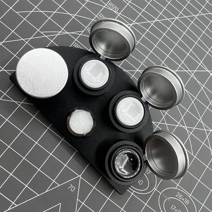 Die-cast alloy oil cup stand with 4 containers and black ceramic inserts for precise watch maintenance.
