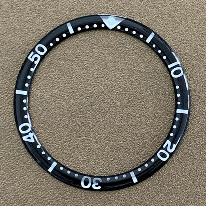 White font 39mm aluminum bezel insert with circular arc bevel for watch customization.