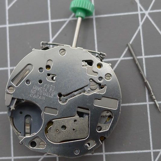 Miyota FS21 chronograph quartz watch movement with date at 4, made in Japan, precision timing accessory.