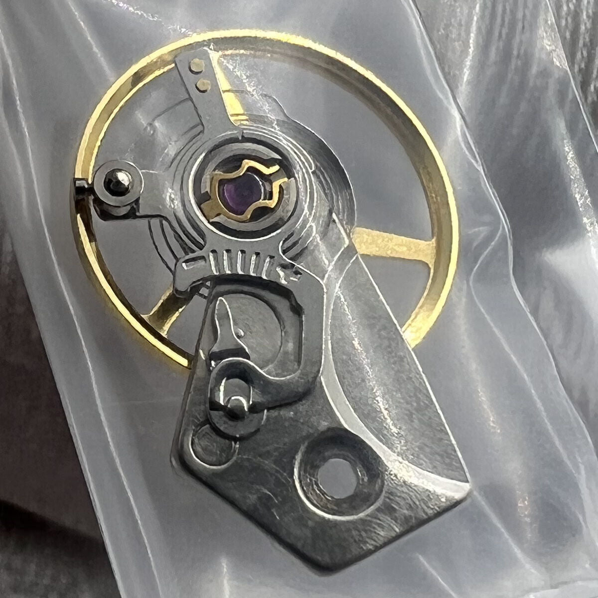 Balance wheel with splint for China Made Dandong 7750 movement, 28800 vibrations per hour, precision watch component by Dandong.