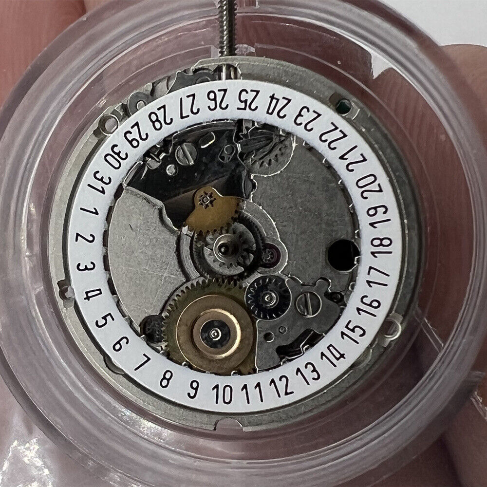 ETA 956.114 white dial quartz watch movement replacement with 3 hands by ETA, precise timekeeping accessory.