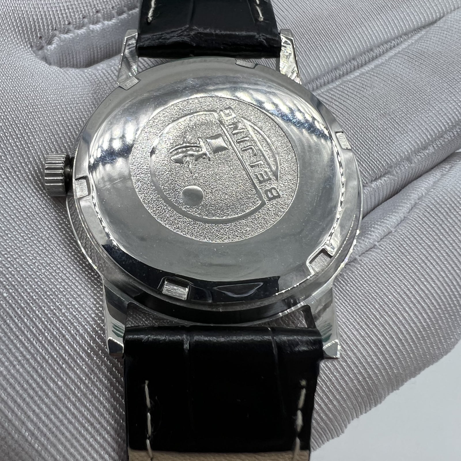 Beijing 36mm Double Rhomb watch with silver case and manual mechanical movement, featuring silver hour markers.