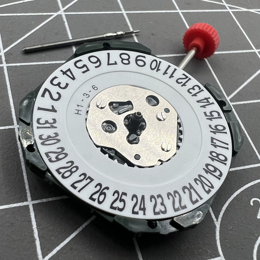 Miyota 2315 quartz watch movement with date display at 6 o'clock, precise timekeeping mechanism.