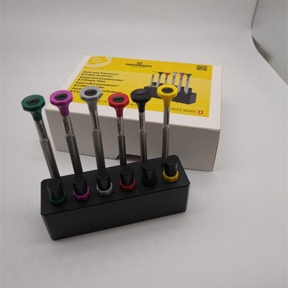 Swiss Bergeon 7778 precision watch screwdriver set with 6 blades, spare tips, and organizer stand for watch repair maintenance.