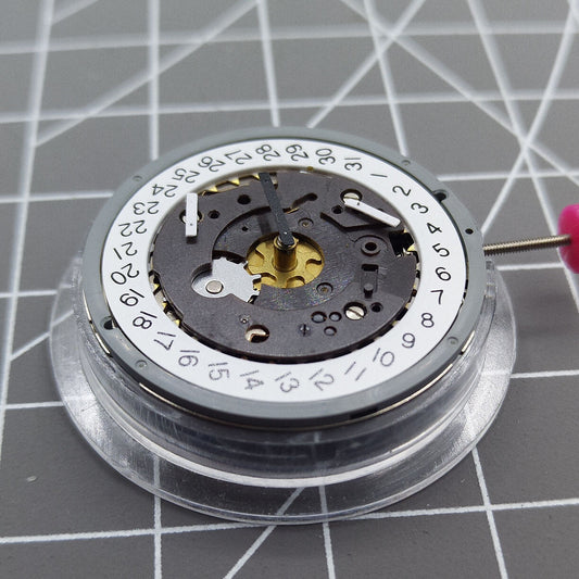 Swiss ISA 8172 watch movement with date at 4, quartz precision by ISA brand for replacement use