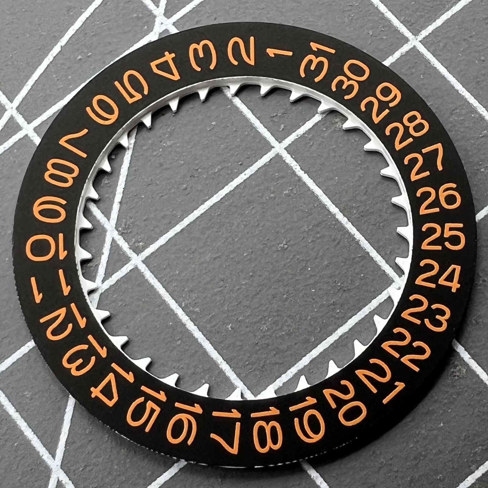 Black background orange date wheel disk for NH35 NH36 watch movement by Seiko-compatible.