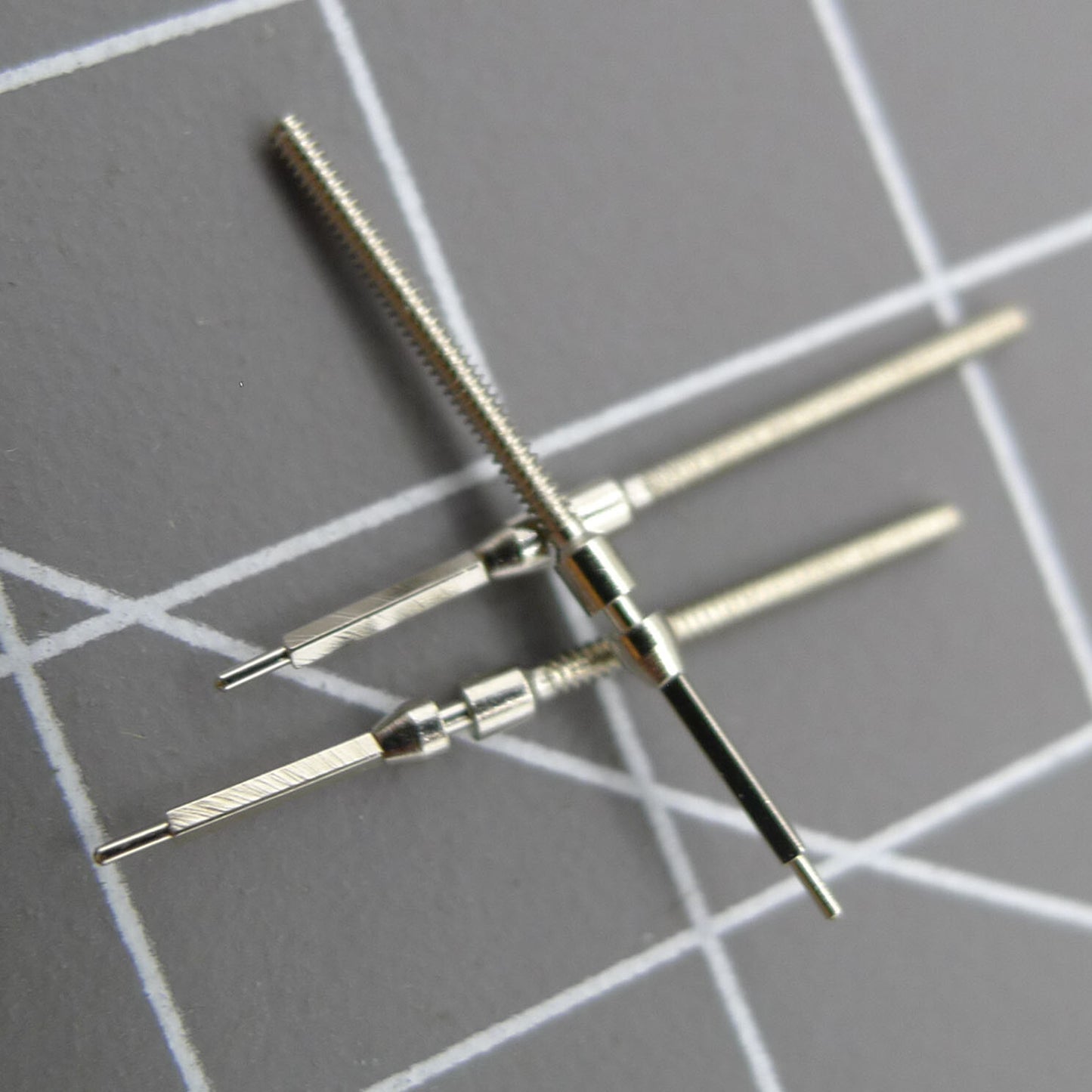 1. Five-piece set of Movement Watch Winding Stems by Miyota 8205, precision spare parts for repairs.  