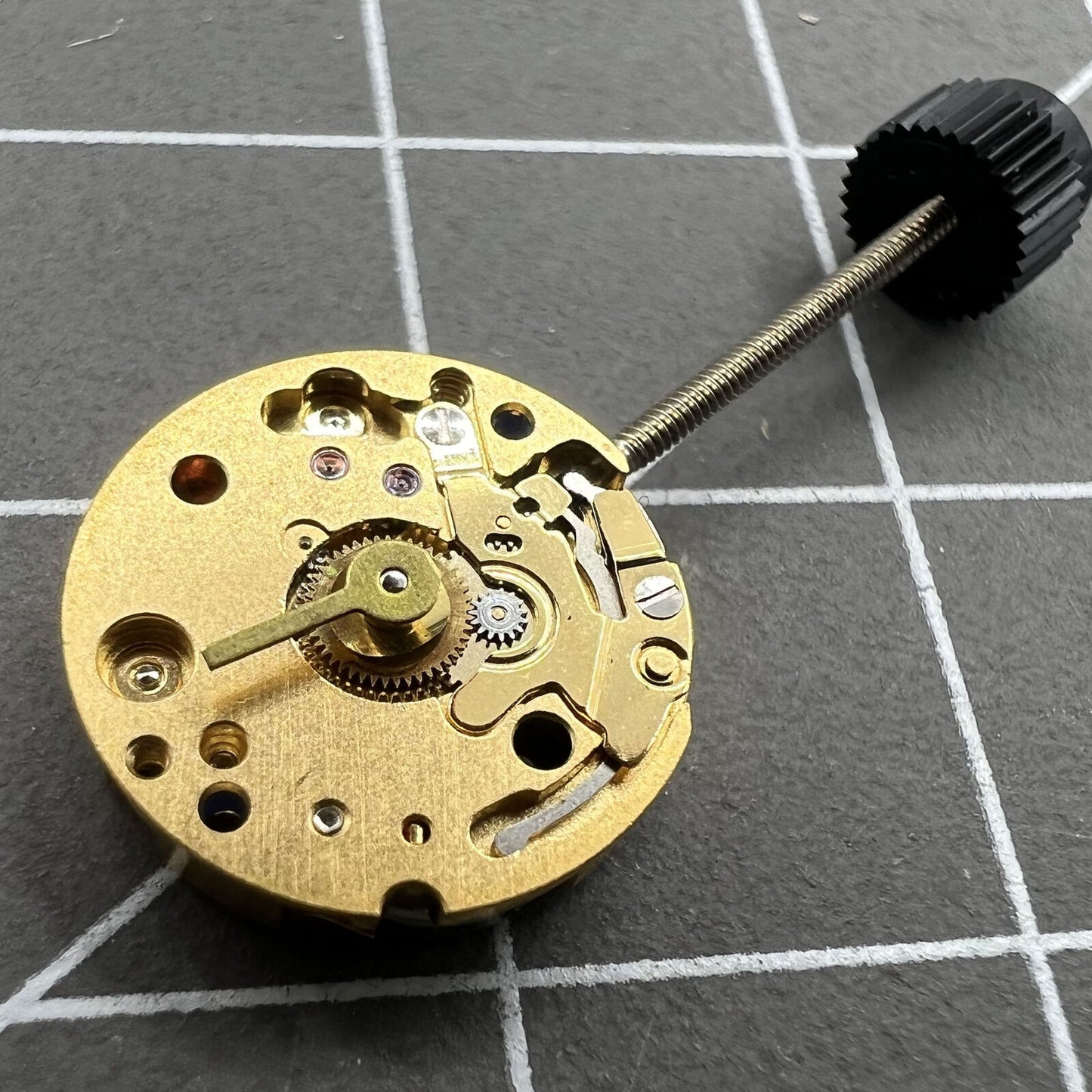 Swiss ETA E01.001 quartz watch movement with 2 hands, precision timekeeping by ETA brand.