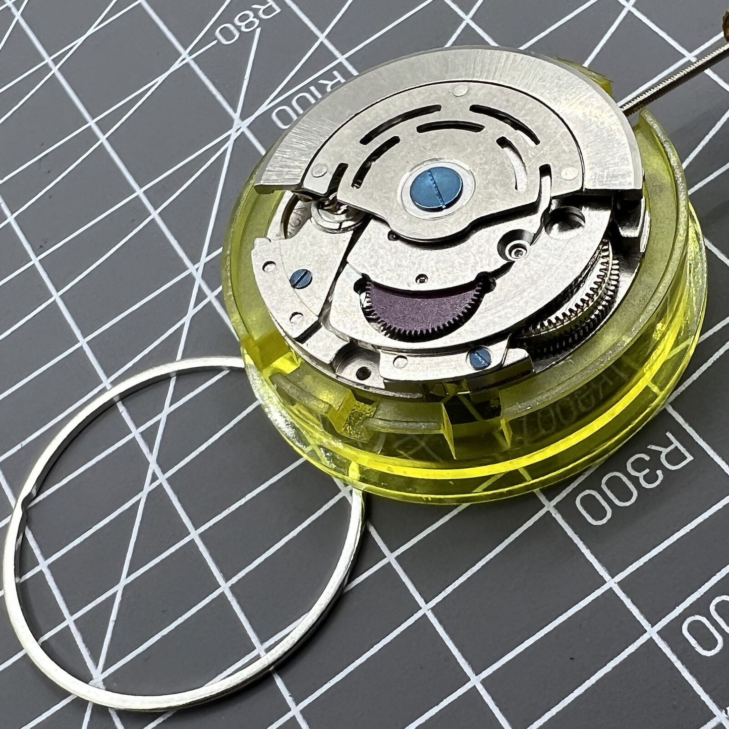 Close-up of DG2813 mechanical watch movement with 3 hands and date, automatic, alternate for 8215/8205 models.