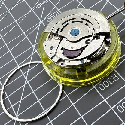 Close-up of DG2813 mechanical watch movement with 3 hands and date, automatic, alternate for 8215/8205 models.