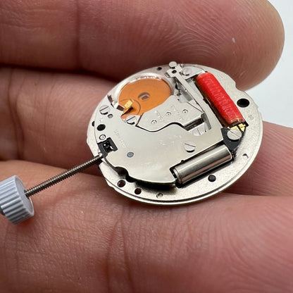 Ronda 788 Quartz watch movement with date at 6, moon phase, Swiss precision.