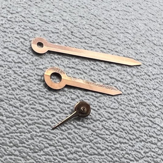 Set of rose gold arrow-shaped watch hands for Miyota 1L45 movement, stylish trim.