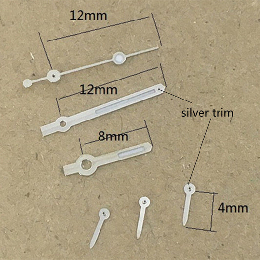 Arrow-shaped silver trim watch hands with green luminous tips for VD53, VD54, VD57 movements.
