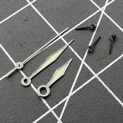 Diamond-shaped green lume watch hands designed for Miyota OS60 movement, enhancing precision.
