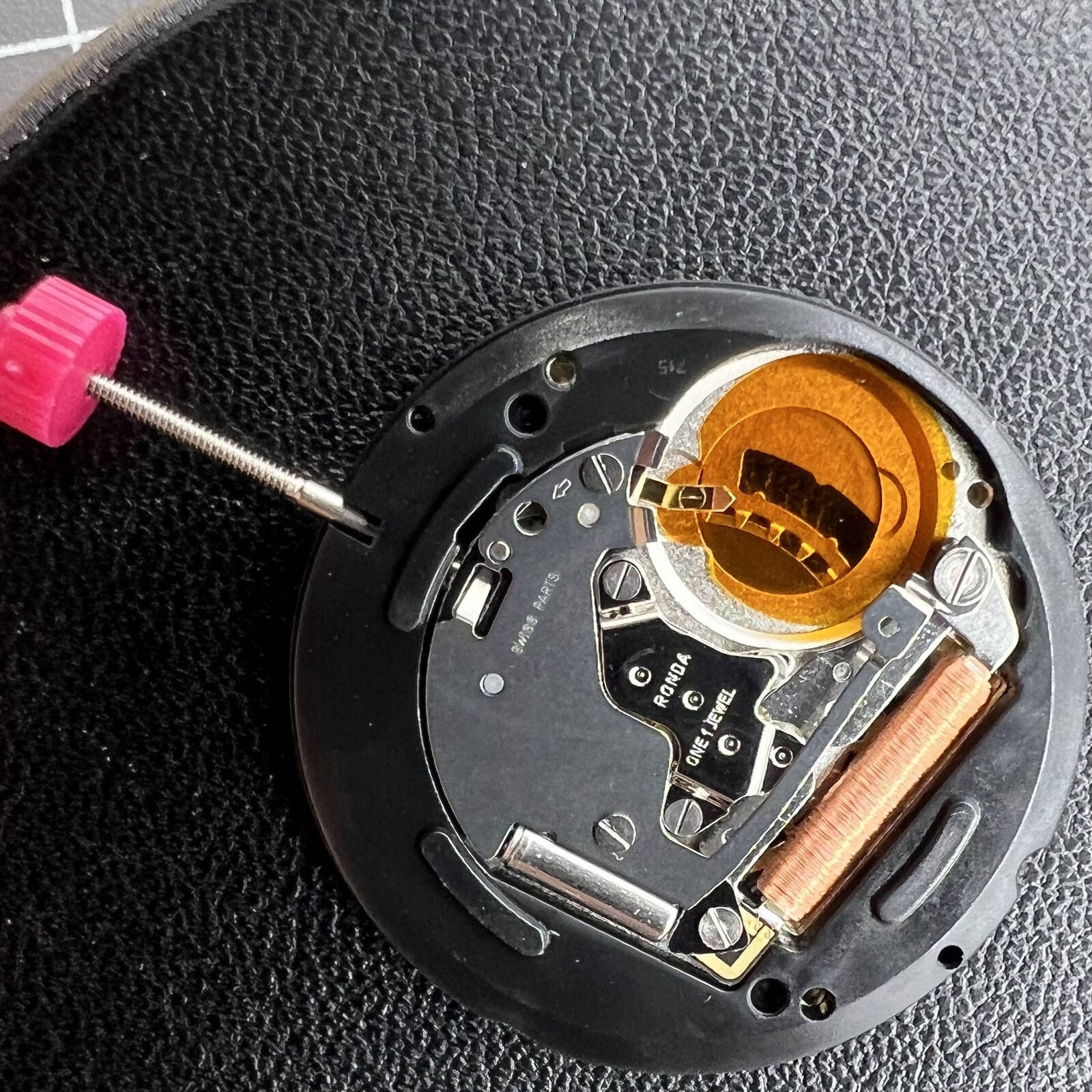 Swiss Made Ronda 715 quartz watch movement with date display, ideal for watch accessory repairs and upgrades.