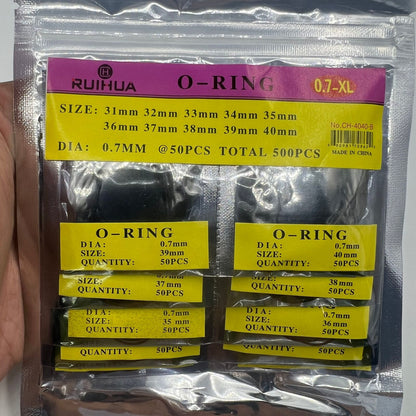 Wholesale pack of 950 assorted silicone watch gaskets and O-rings for watch case sealing.