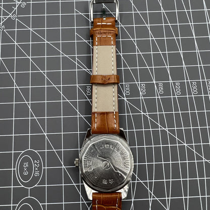 33mm Chunlan manual steel watch with silver dial, 17-jewel movement, and sleek black leather band.