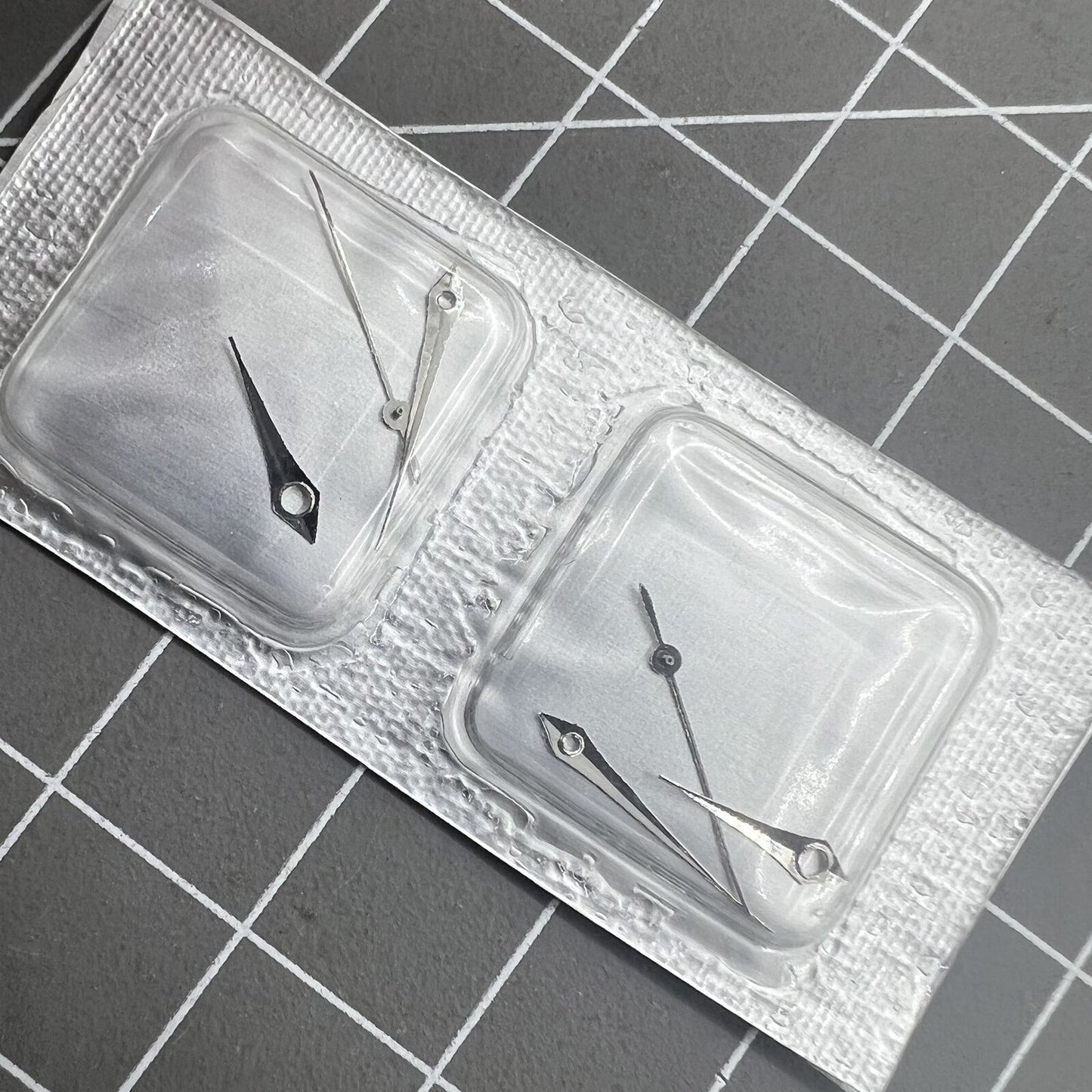 Silver 15mm arrow-shaped watch hands set for Miyota 2035 movement, precision design.