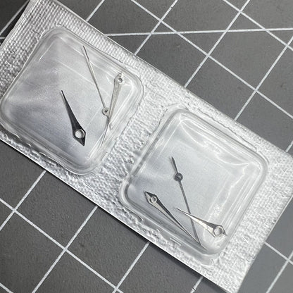 Silver 15mm arrow-shaped watch hands set for Miyota 2035 movement, precision design.