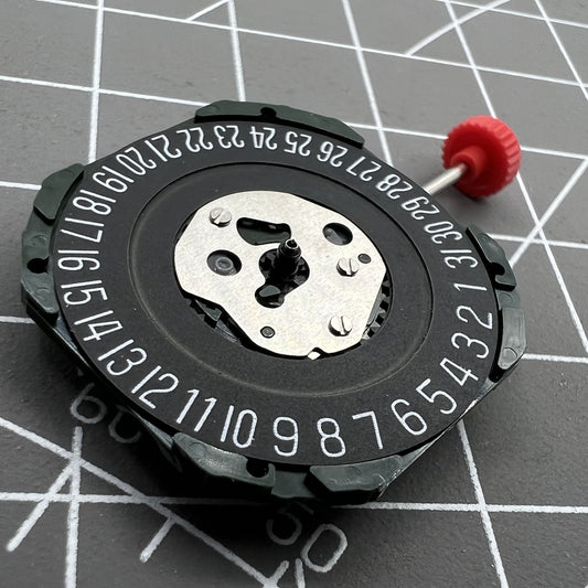 Black dial watch with Miyota 2315 quartz movement, 3 hands, date at 6, compatible stem, by Miyota.